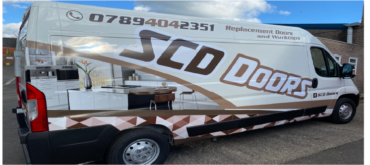 Part van vehicle wrap on SCD Doors van