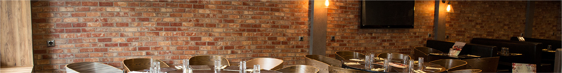 Brick effect wall wrapping installation at a restaurant