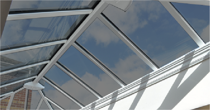 Solar-control window film on a white-framed glass conservatory roof