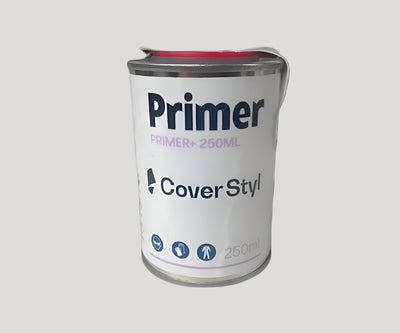 Can of Cover Styler Primer on a white background