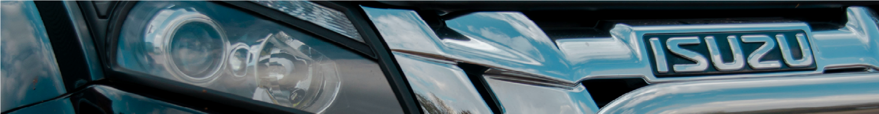 Cropped photo of a close up of the front of an Isuzu after having Isuzu window tints installed