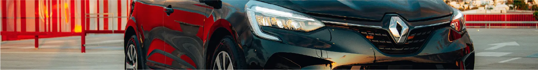 Renault car featuring freshly tinted windows on a car park