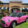 Am image of Oracal Gloss Soft Pink Vinyl Wrap installed on a Bentley