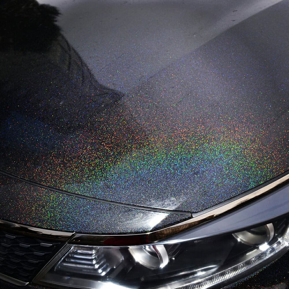 An image of Oracal Matt Black Galact Gold Vinyl Wrap installed on a BMW