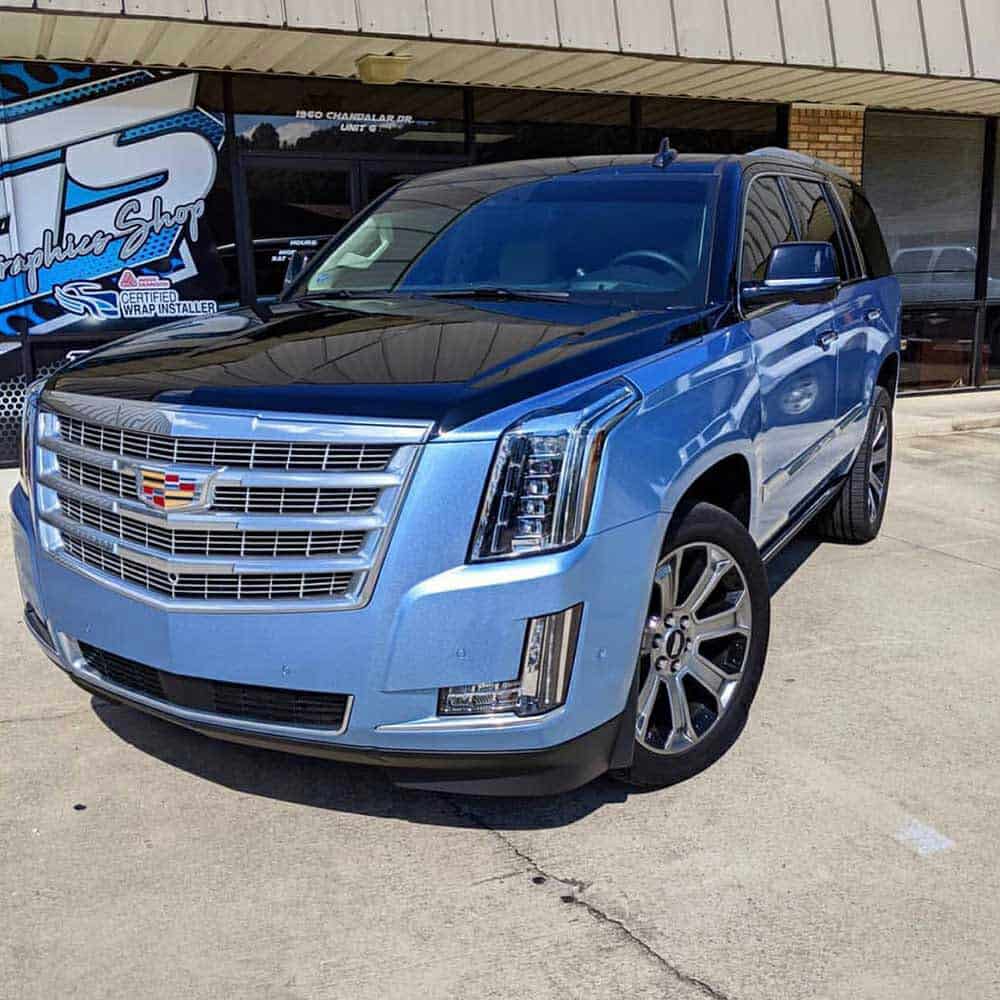 An image of Oracal Gloss Jetstream Blue Vinyl Wrap installed on a Cadillac
