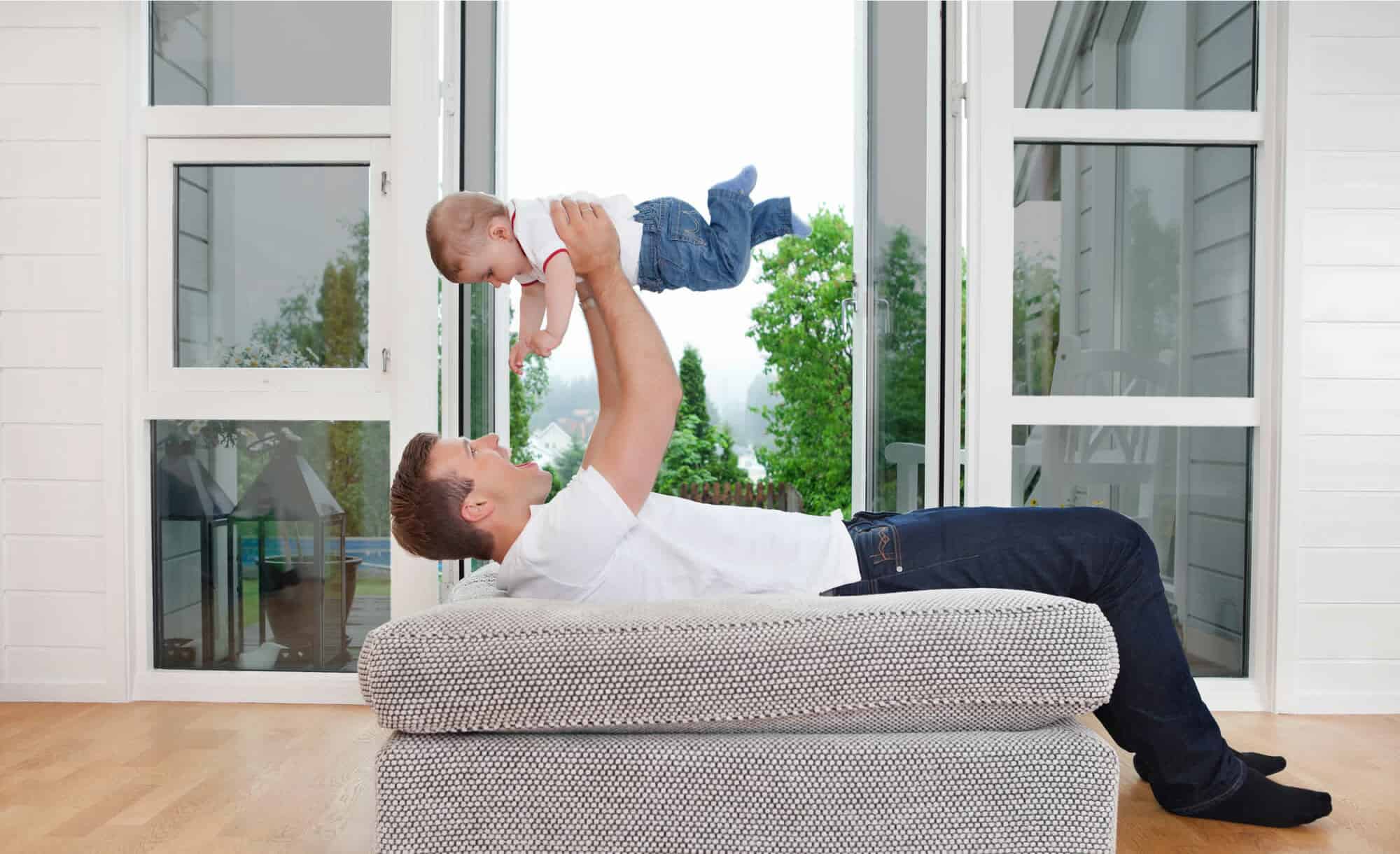 About Us Photo of man and child enjoying lif infront of tinted windows